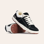 Black suede casual sneakers with white laces and rubber sole by Simple.