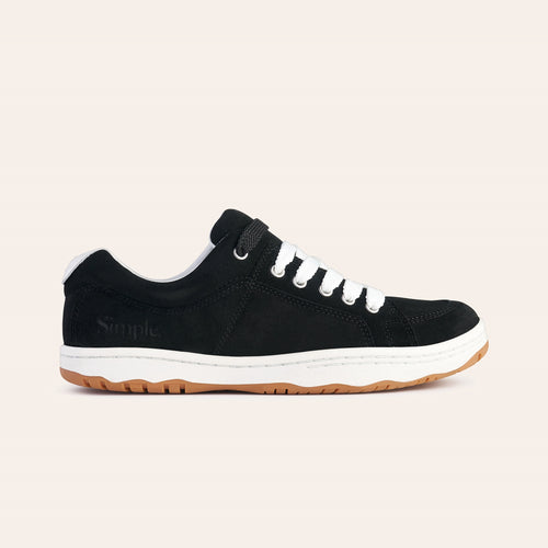 Black suede sneakers with white laces and a gum sole, perfect for casual wear.