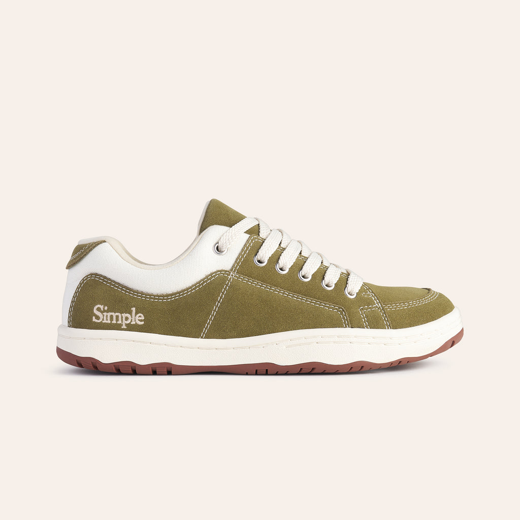 Simple olive green sneakers with white accents, featuring a comfortable canvas material and lace-up design.